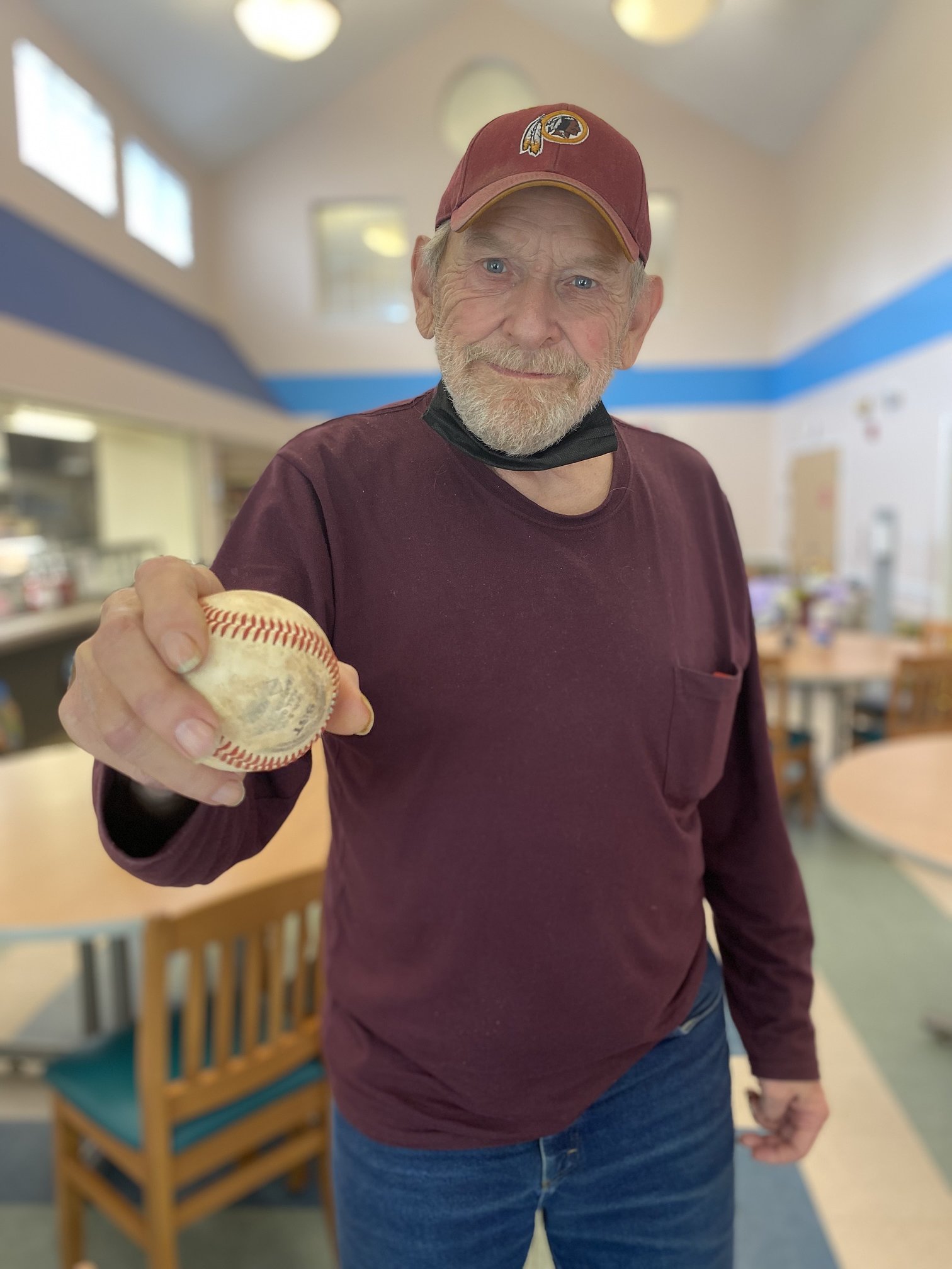 John Franklin holding a baseball