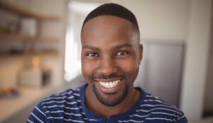 African American man smiling at the camera