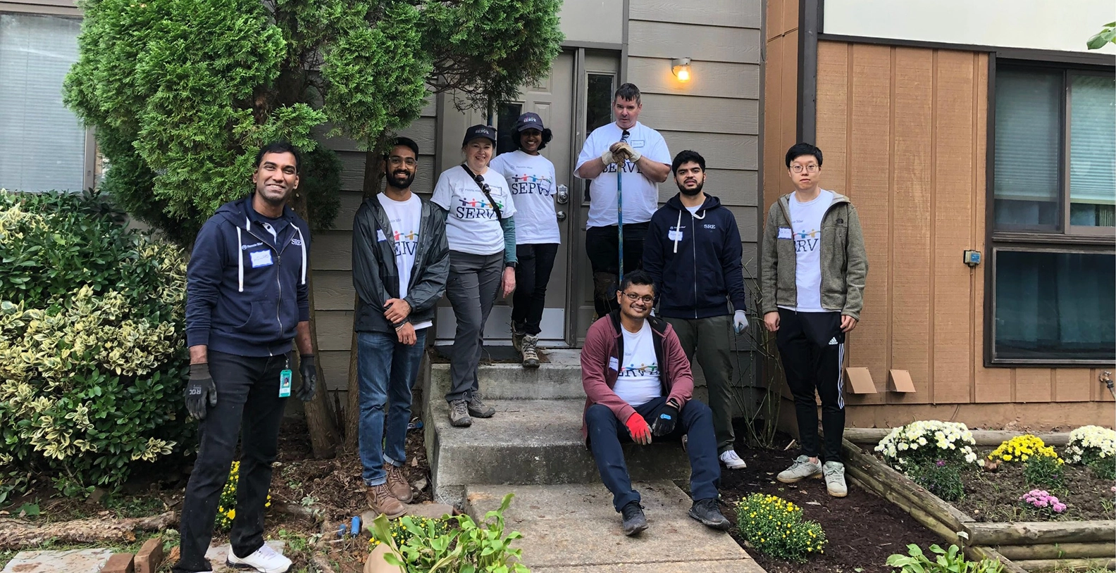 SERV volunteers helping at a Pathway Homes property