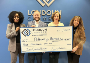 Pathway Homes accepting Donation check of $4,000 from Loudoun Chamber of Commerce