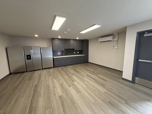 920-square-foot food storage space provides ample storage for
nonperishable food items and essential supplies. The space also features a fully
equipped kitchen designed to safely store and prepare perishable foods